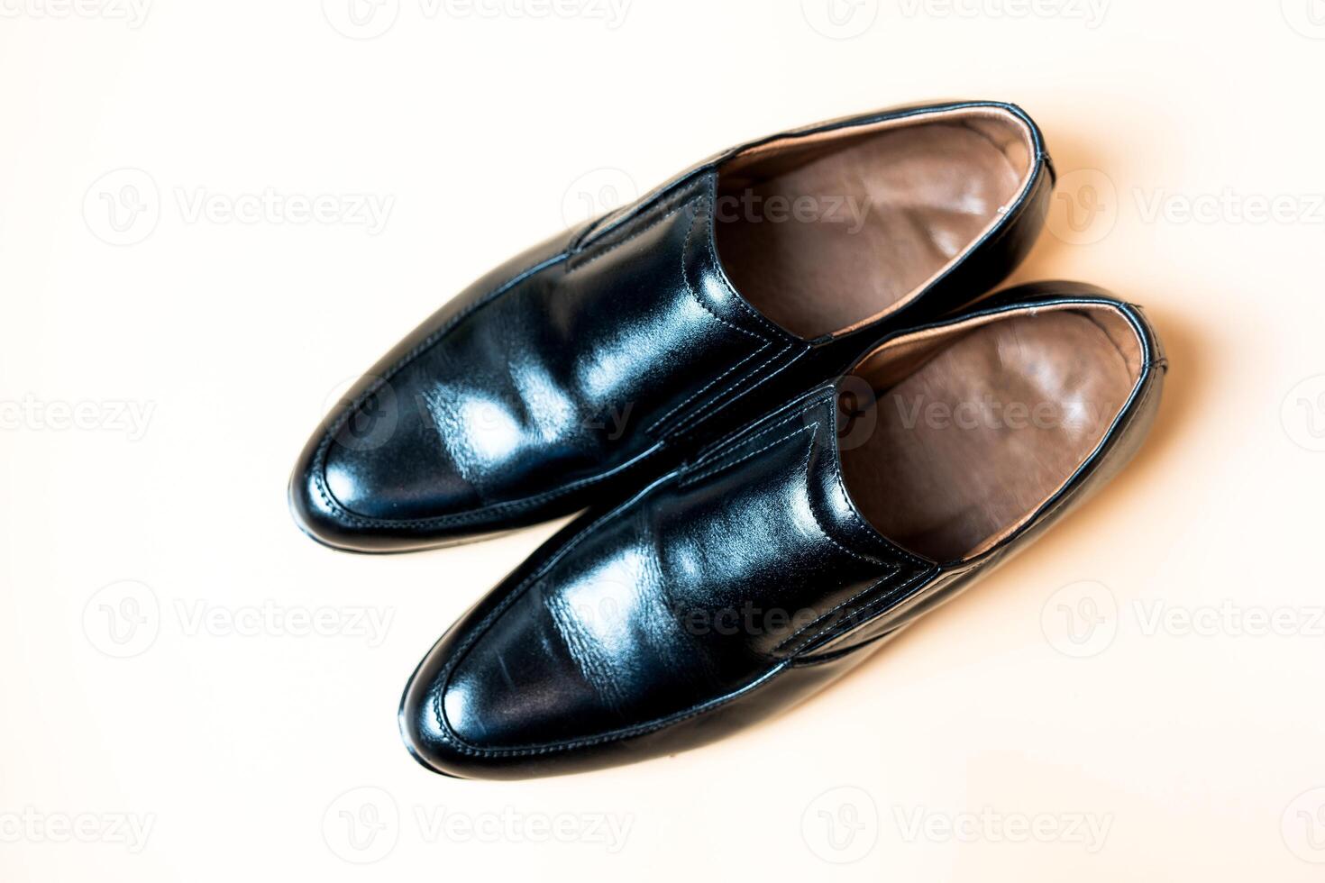 Simple black leather shoes for men, pair of low heel shoes luxury classic and formal style for businessman. photo