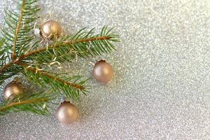 Christmas or New Year decoration background fur tree branches, colorful glass balls on black grunge background with copy space photo