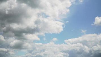Clouds shifting in a sunny blue sky video