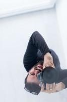 young Photographer takes pictures with DSLR camera photo