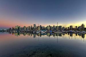 Vancouver Downtown Skyline at dusk from Stanley Park, Canada. photo