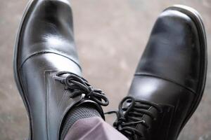 Black leather dress shoes with laces photo