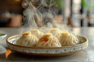 Plate of freshly steamed dumplings. Steam rises above the dumplings, highlighting their freshness. photo