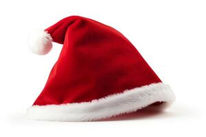 A plush red Santa hat with a wide white fur trim. The hat is isolated on a white background. photo