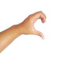Closeup of male asian hand isolated on white background. Young man forming shape of half of heart with his fingers. Horizontal color photography. Point of view shot with copy space. photo