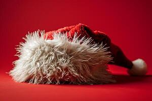 Santa Claus Hat on a Red Background photo