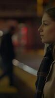 A Contemplative Moment Amidst the Vibrant Urban Setting at Night Under the Stars video