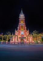 Tan Dinh church, special pink worship place in Ho Chi Minh. The sentence on the plate means Tan Dinh Catholic Church. Before Christmas Day in Vietnam. photo
