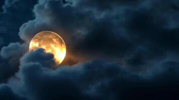 A full moon is seen in the sky with clouds video