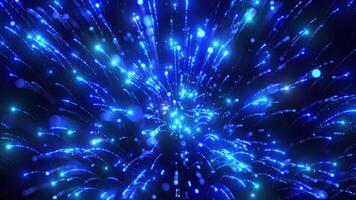 The blue light glitters dust particles creating a beautiful bokeh. Elegant abstract background with light particle explosion. Abstract background particles. Seamless looping video