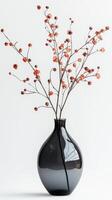 Elegant black vase with decorative branches featuring red flowers arranged on a minimalistic background photo