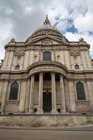 The Cathedral of St. Paul is captured head on, dis playing its monumental dome and sculpted stonework, a true masterpiece of English Baroque architecture. photo